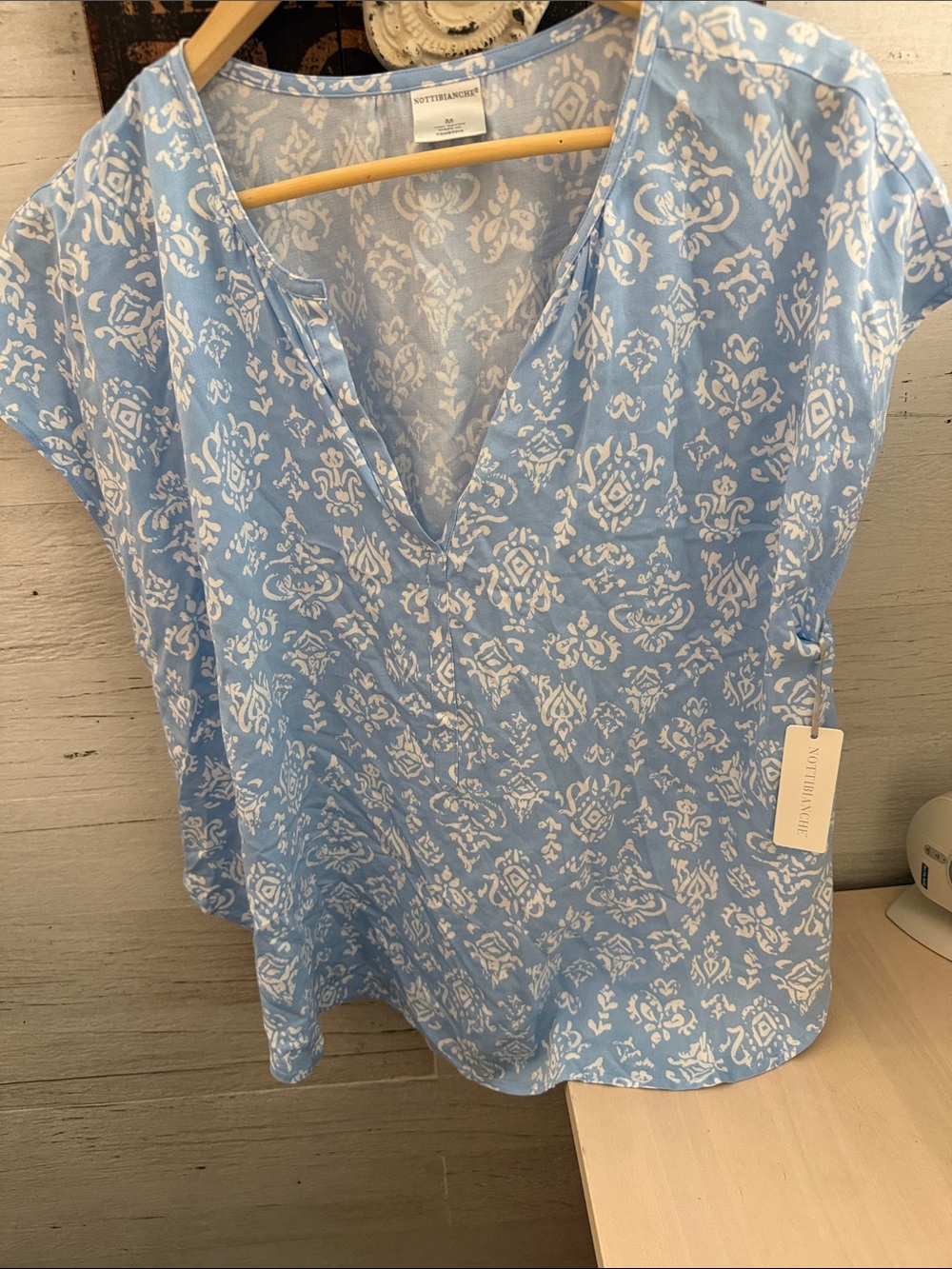 Nottibianche Light Blue V-Neck Short Sleeve Printed Blouse High Low Hem Rayon